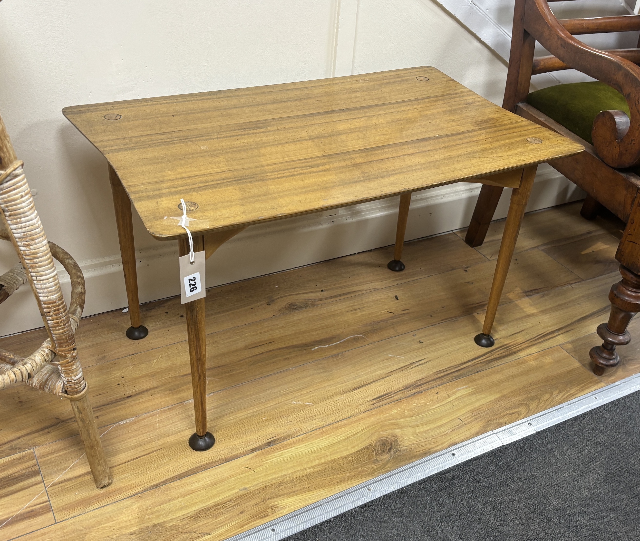 In the manner of Morris, Glasgow, a mid century walnut low table, width 75cm, depth 45cm, height 44cm
